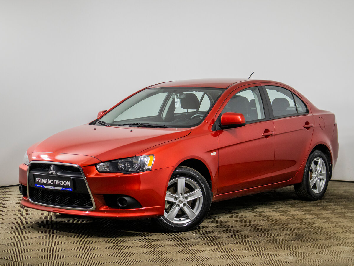 Мицубиси минусы. Mitsubishi Lancer 2013. Митсубиси Лансер 2013. Mitsubishi Lancer 2015 красный. Mitsubishi Lancer 2009.